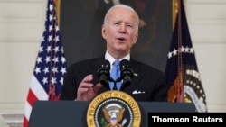 FILE: U.S. President Biden speaks about the administration's coronavirus response at the White House in Washington