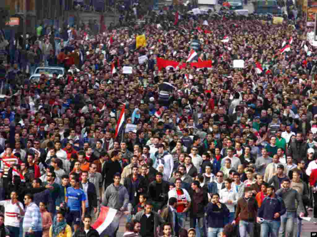 On January 25, 2011, a crowd of demonstrators walk through Cairo in a Tunisia-inspired demonstration to demand the end of Egyptian President Hosni Mubarak's nearly 30 years in power. (AP)