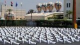 Egyptian military soldiers demonstrate their skills during a ceremony at a military base east of Cairo. (Photo released by Egyptian Presidency)