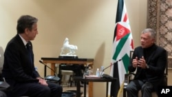 Secretary of State Antony Blinken, left, listens during a meeting with Jordan's King Abdullah II at Bayt Al Urdon, May 26, 2021, in Amman, Jordan. 