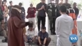 Two male college students publicly flogged for having consensual gay sex in Indonesia
