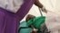 A patient suffering from HIV is taken to a local hospital in Harare, January 31, 2012. 