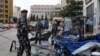 Lebanese security forces pull down tents as they clear away a protest camp and reopened roads blocked by demonstrators since protests against the governing elite started in October, in Beirut, Lebanon, March 28, 2020. 