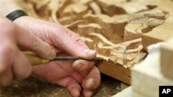 Teens learn to follow directions and make projects in wood-working class.