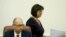 FILE - Ukrainian Finance Minister Natalia Yaresko (R) walks past Prime Minister Arseny Yatseniuk during a government meeting in Kyiv.