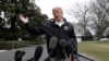 President Donald Trump talks with reporters outside the White House, March 8, 2019, in Washington.