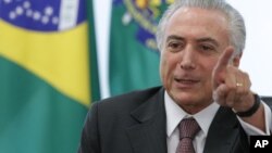 Le président du Brésil Michel Temer s'exprime pendant une rencontre avec les syndicats sur les propositions du gouvernement concernant la sécurité sociale à Brasilia, Brésil, le 16 mai 2016. 