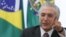 FILE - The administration of Brazilian President Michel Temer has been cautious in reacting to the U.S. election, but officials have acknowledged that the country's incipient recovery could suffer if Donald Trump makes good on his promises to limit trade.