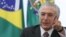 FILE - Brazil President Michel Temer speaks during a meeting with trade unions on the government's proposal for Social Security reform in Brasilia, Brazil,  May 16, 2016. Temer sent Donald Trump his congratulations and hopes they can work together. 