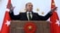 Turkish President Recep Tayyip Erdogan addresses people from southeastern Turkey, in Ankara, Turkey, Tuesday, Oct. 20, 2015.