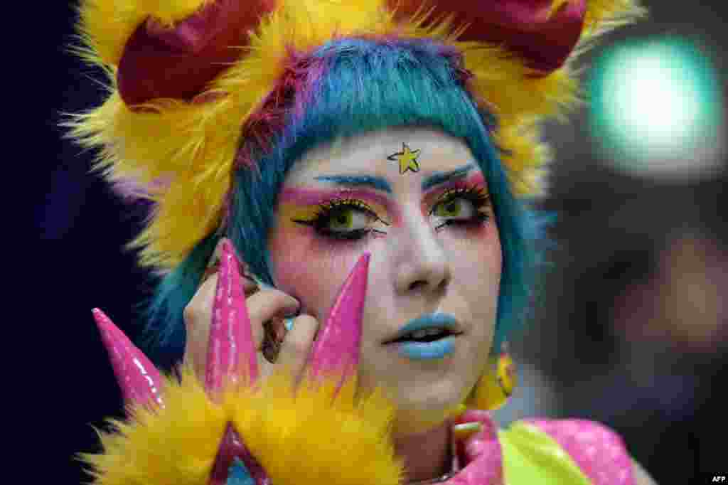 A woman dressed in costume attends the Supanova Pop Culture Expo in Sydney, Australia. The three-day event in which thousands of fans dress up in &quot;Cosplay&quot;, showcases the latest comic books, animation, cartoons, science-fiction, and console gaming.