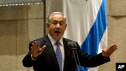 Israeli Prime Minister Benjamin Netanyahu speaks during a session of the Knesset, Israel's parliament, in Jerusalem, Oct. 27, 2014.