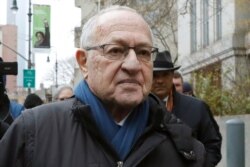 FILE - Attorney Alan Dershowitz leaves federal court in New York, Dec. 2, 2019.