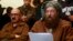 Maulana Sami ul-Haq (R), one of the Taliban negotiators, reads a joint statement with Irfan Siddiqui, a government negotiator, during a news conference in Islamabad, Feb. 6, 2014.