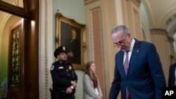 Senate Minority Leader Chuck Schumer, D-N.Y., walks back to the chamber in Washington, Jan. 31, 2020.