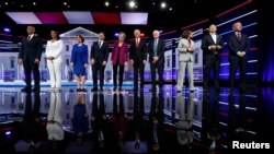 Democratic presidential candidates Sen. Cory Booker, Rep. Tulsi Gabbard, Sen. Amy Klobuchar, Mayor Pete Buttigieg, Sen. Elizabeth Warren, former Vice President Joe Biden, Sen. Bernie Sanders, Sen. Kamala Harris, Andrew Yang and Tom Steyer in Atlanta.