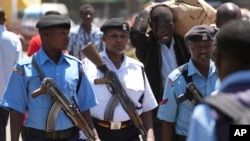 FILE—Kenya police patrol the streets of Nairobi, Kenya, March.12, 2024. 