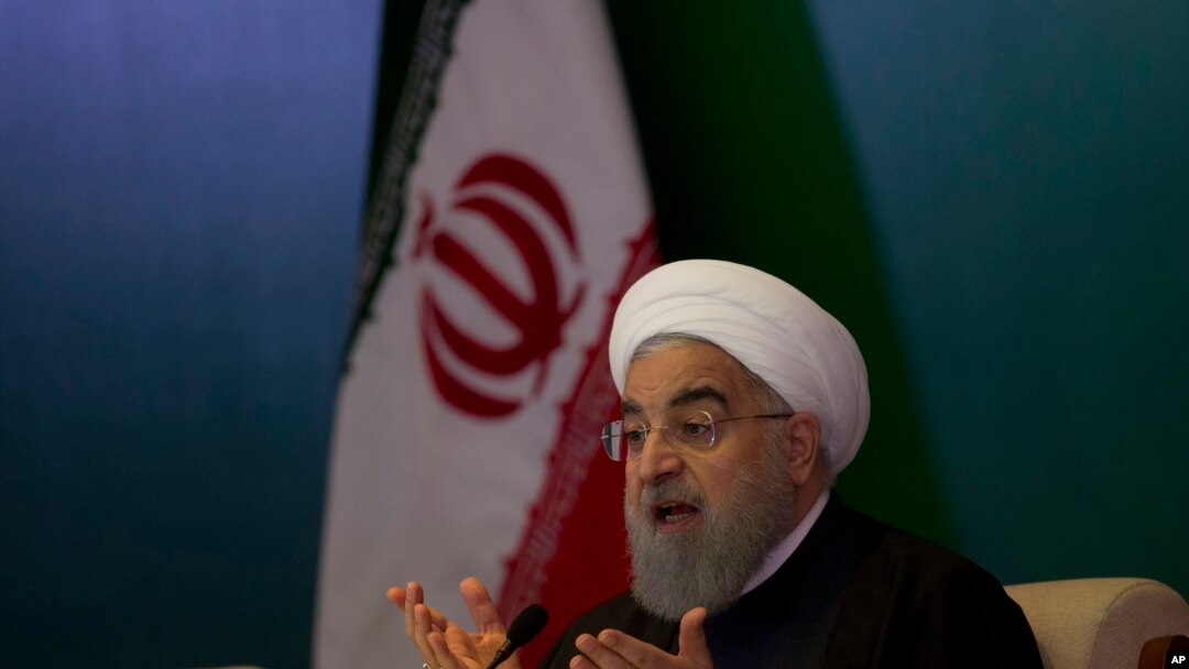 FILE - Iranian President Hassan Rouhani speaks during a meeting with Muslims leaders and scholars in Hyderabad, India, Feb. 15, 2018.