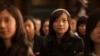 Chinese students listen to President Obama speak during a town hall in China.