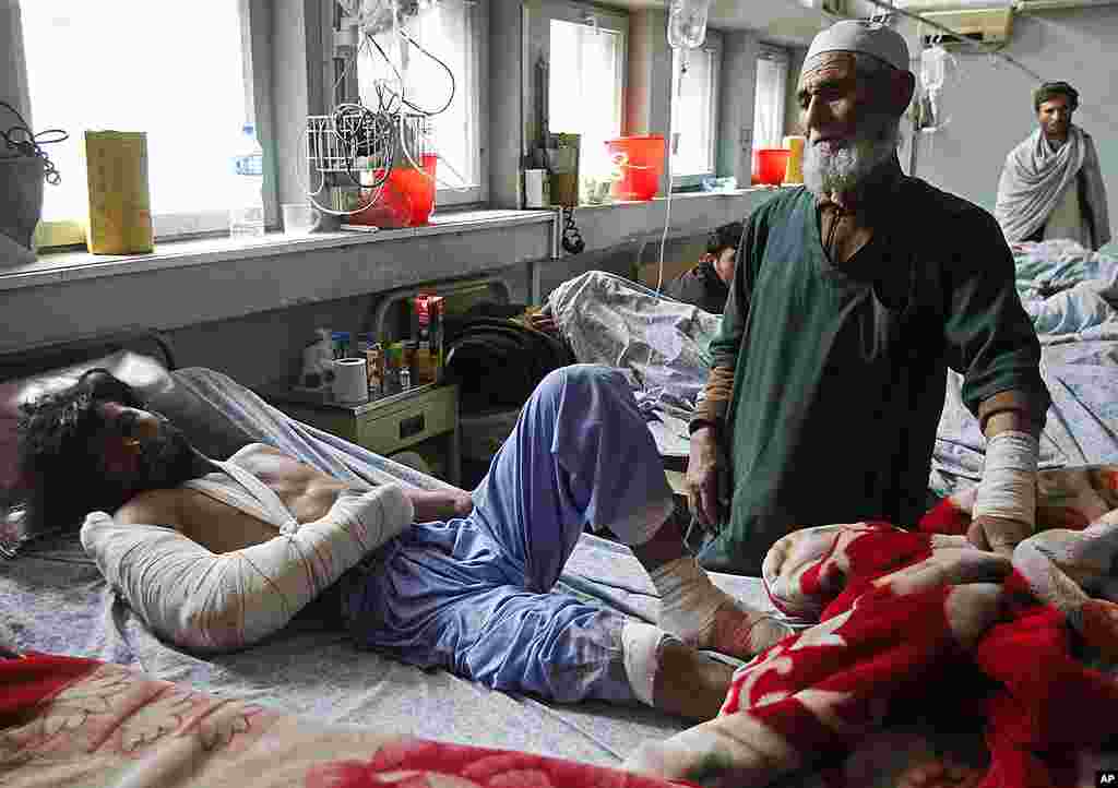 An Afghan man receives treatment at a hospital in Jalalabad province after a suicide car bomber attacked a military airport on February 27, 2012. (Reuters)