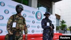 Military and police stand guard as West African leaders meet to discuss transitional roadmap for Guinea - as well as Mali and Burkina Faso, in Accra, Ghana. 7.3.2022