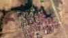 This handout satellite image from Planet Labs taken on May 23, 2020, and released by Human Rights Watch on May 26 shows Let Kar village in Myanmar's Rakhine state, after buildings in the village are believed to have been destroyed by fire.