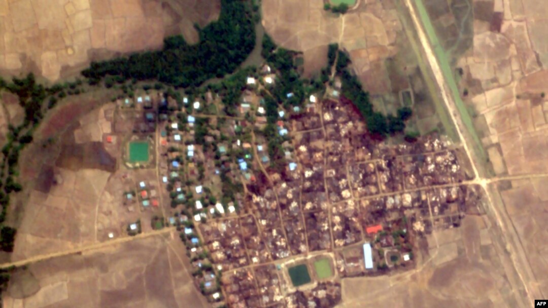 This handout satellite image from Planet Labs taken on May 23, 2020, and released by Human Rights Watch on May 26 shows Let Kar village in Myanmar's Rakhine state, after buildings in the village are believed to have been destroyed by fire.