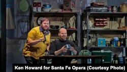 Edward Parks, as Jobs, and Garrett Sorenson, as Woz, get creative in Jobs' garage.