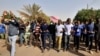 Sudanese demonstrators chant slogans as they participate in anti-government protests in Khartoum, Sudan, Jan. 17, 2019. Rudwan Dawod, a political activist with the group Sudan of the Future Campaign, vanished hours before the protests were slated to begin Thursday, his wife said.