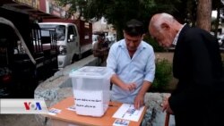 هاوڵاتیەکی هەڵەبجە سندوقێکی دەنگدانی داناوە بۆ بەشداریکردنی خەڵک لە هەڵبژاردنەکانی ئەمەریکا