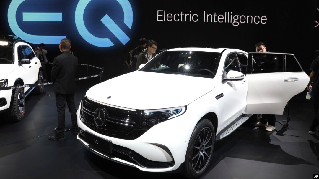 Mercedes Benz displays its first all-electric model in China, the EQC 400 SUV during the Auto Shanghai 2019 show in Shanghai Tuesday, April 16, 2019. (AP Photo/Ng Han Guan)