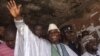 Sierra Leone's incumbent President Ernest Bai Koroma waves to supporters after voting in the capital Freetown, November 17, 2012.