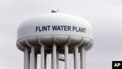 The Flint, Michigan,water tower is seen in this Feb. 5, 2016 photo. 