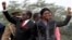 FILE: Zimbabwean President Robert Mugabe and his wife Grace wave to supporters and guests during celebrations to mark his 90th birthday, Marondera,Feb. 23,2014.