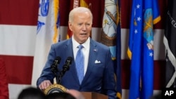 President Joe Biden speaks at a "Friendsgiving" event with service members and their families in the Staten Island borough of New York, Nov. 25 2024.