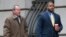 FILE - William Porter, right, one of six Baltimore city police officers charged in connection to the death of Freddie Gray, walks into a courthouse with his attorney Joseph Murtha for jury selection in his trial, Nov. 30, 2015, in Baltimore. 