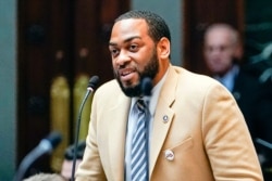 FILE - Kentucky Democratic State Representative Charles Booker speaks on the floor of the House of Representatives, in the State Capitol in Frankfort, Kentucky, Feb. 19, 2020.