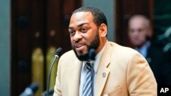 FILE - Kentucky Democratic State Representative Charles Booker speaks on the floor of the House of Representatives, in the State Capitol in Frankfort, Kentucky, Feb. 19, 2020. 