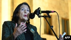 Georgia's President Salome Zurabishvili gives a speech at an opposition rally to protest results of the parliamentary elections that showed a win for the ruling Georgian Dream party, outside the parliament building in central Tbilisi on Oct. 28, 2024.