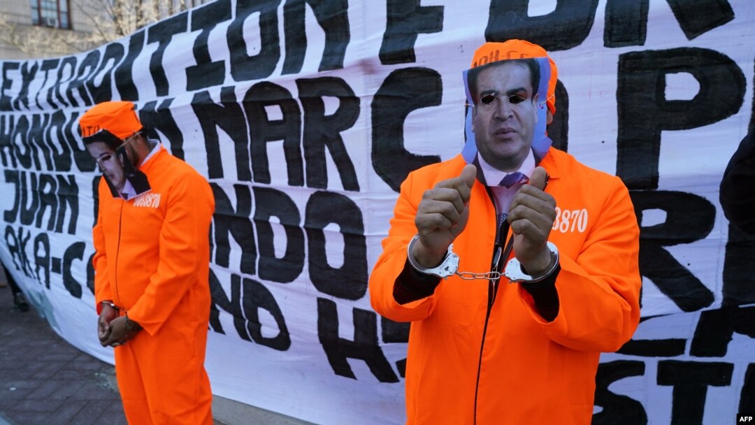 Protesters celebrate outside the U.S. District Court Southern District of New York after Tony Hernandez, brother of the president of Honduras Juan Orlando Hernandez, was sentenced to life for drug trafficking offenses, March 30, 2021.