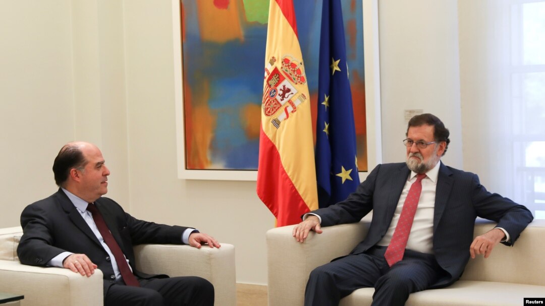 Spanish Prime Minister Mariano Rajoy, right, and Julio Borges, president of the National Assembly and lawmaker of the Venezuelan coalition of opposition parties, meet at Moncloa Palace in Madrid, Sept. 5, 2017. 