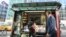 FILE - A misinformation newsstand is seen in midtown Manhattan on Oct. 30, 2018, aiming to educate news consumers about the dangers of disinformation, or fake news, in the lead-up to the US midterm elections. 