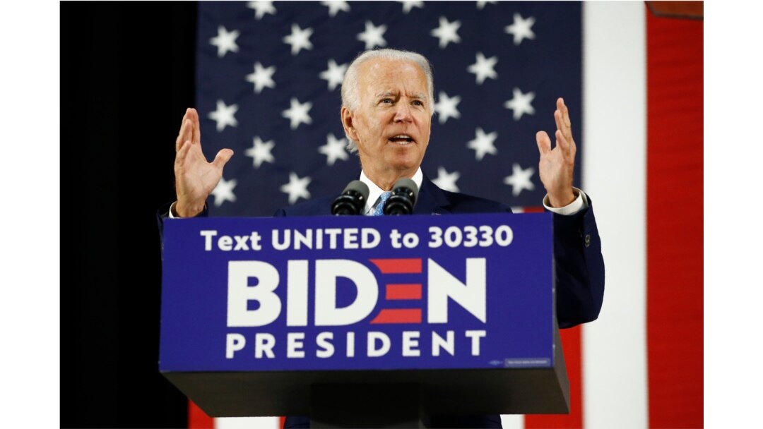 FILE - Democratic presidential candidate former Vice President Joe Biden speaks at Alexis Dupont High School in Wilmington, Delaware, June 30, 2020.
