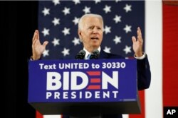FILE - Democratic presidential candidate former Vice President Joe Biden speaks at Alexis Dupont High School in Wilmington, Delaware, June 30, 2020.