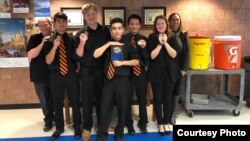 Braxton Moral, third from left, spends his afternoons on the debate team at Ulysses High School in Ulysses, Kansas.