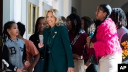 First lady Jill Biden gives students a tour of the White House on the day of the unveiling of the new enhanced White House public tour, in Washington, Oct. 21, 2024.