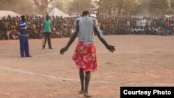 Wrestlers in a camp for war-displaced Nuba struggle to maintain their cultural strength in a documentary film (Courtesy Hajooj Kuka)