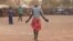Wrestlers in a camp for war-displaced Nuba struggle to maintain their cultural strength in a documentary film (Courtesy Hajooj Kuka)