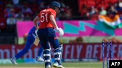 Jonny Bairstow of England is bowled by Axar Patel of India during the ICC men's Twenty20 World Cup 2024 semi-final cricket match between India and England at Providence Stadium in Georgetown, Guyana, on June 27, 2024. (Photo by Randy Brooks / AFP)