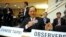 FILE - Taiwan's health minister Ching-Chuan Yeh shows his badge at the World Health Assembly in Geneva, Switzerland, May 18, 2009.